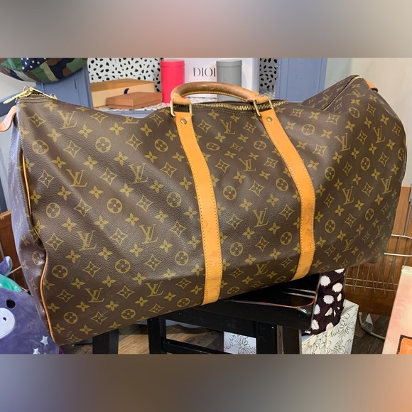 Louis Vuitton Handbags - LOUIS VUITTON
Keepall Bandouliere 60 Monogram Canvas Duffel Bag